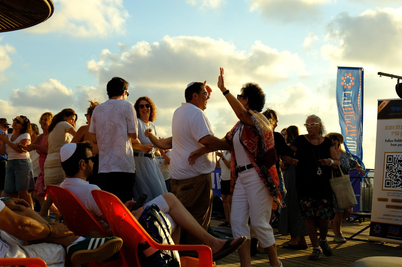 People dancing together outdoors in Israel